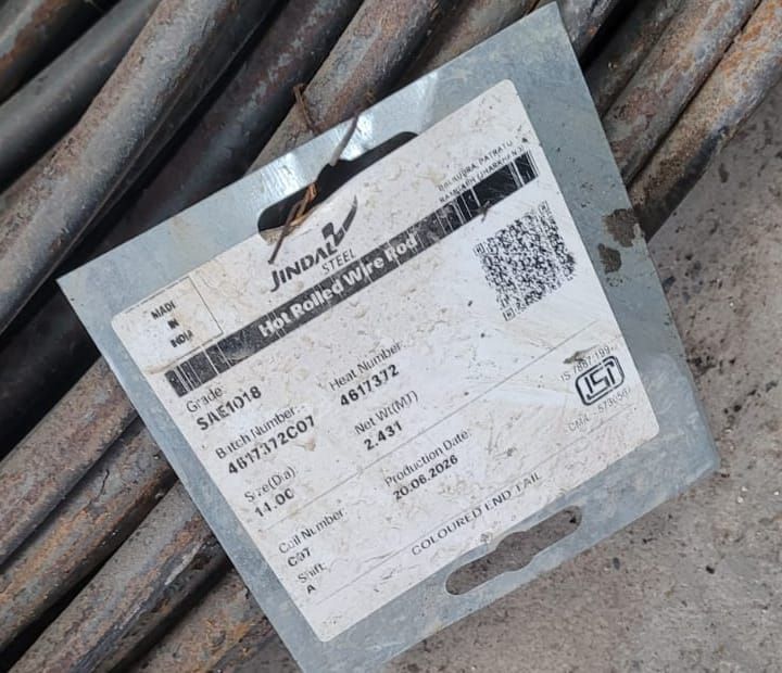 A Jindal Steel mill tag attached to a wire rod coil in our warehouse, showing the batch and heat numbers