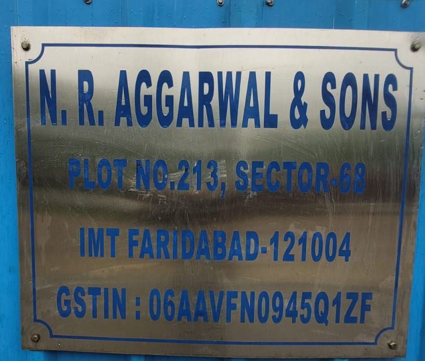 Nameplate at the gate reading N. R. Aggarwal & Sons, Plot No. 213, Sector-68, IMT Faridabad-121004, GSTIN 06AAVFN0945Q1ZF